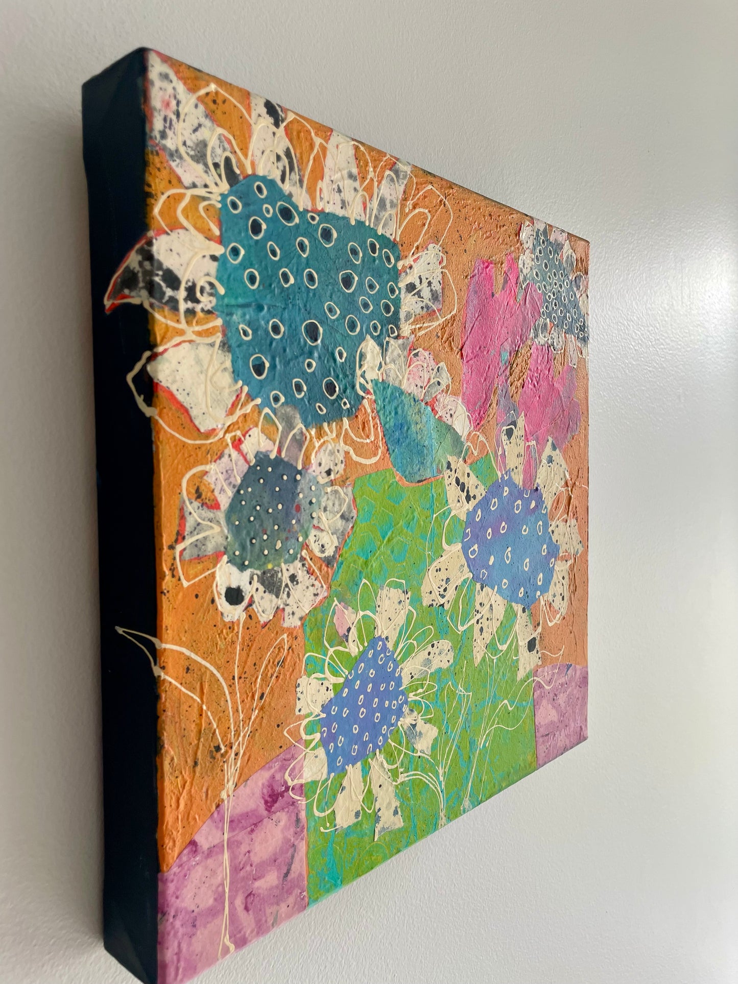 “Too Much Bloom for the Vase” $350 - 12"x 12" mixed media Acrylic and painted papers on canvas