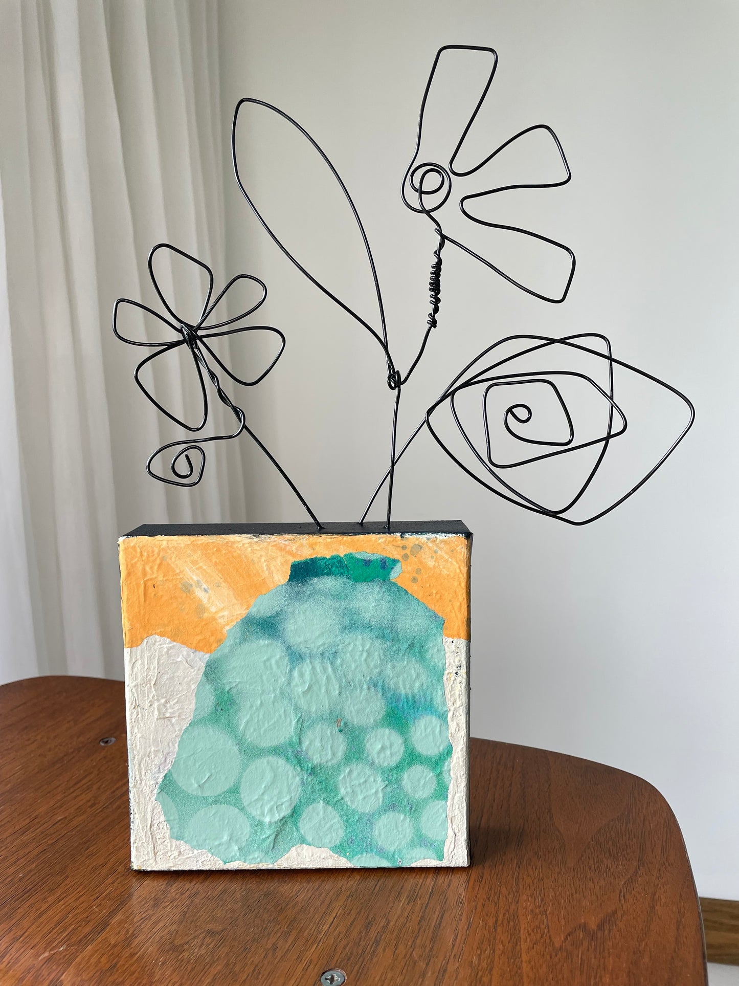 “The Bloom Above” $150- 6"x 6" canvas with wire doodle flowers emerging from the top