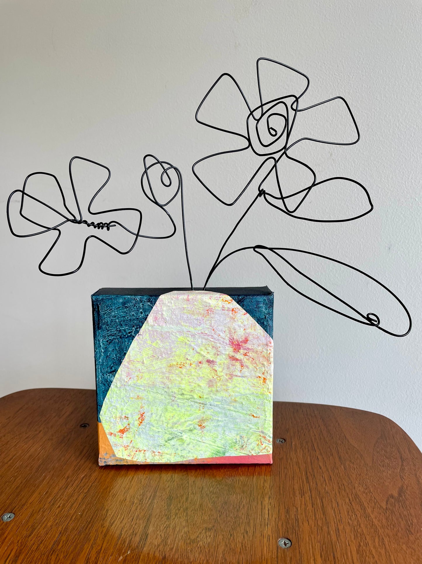 “Doodle Bloom Blossom McQuirk” $150- 6"x 6" canvas with wire doodle flowers emerging from the top