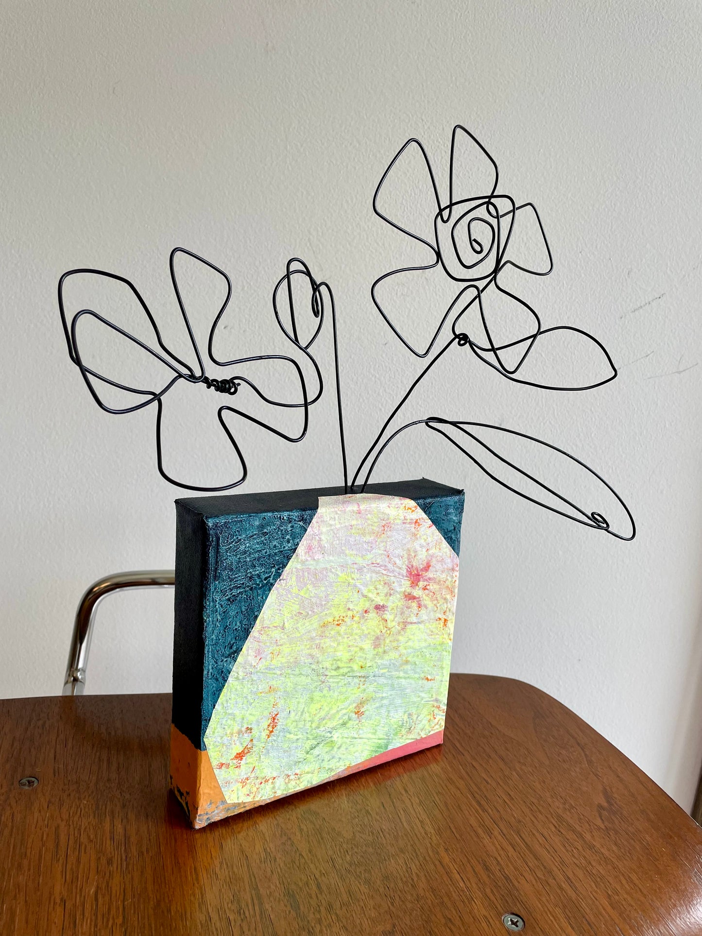 “Doodle Bloom Blossom McQuirk” $150- 6"x 6" canvas with wire doodle flowers emerging from the top
