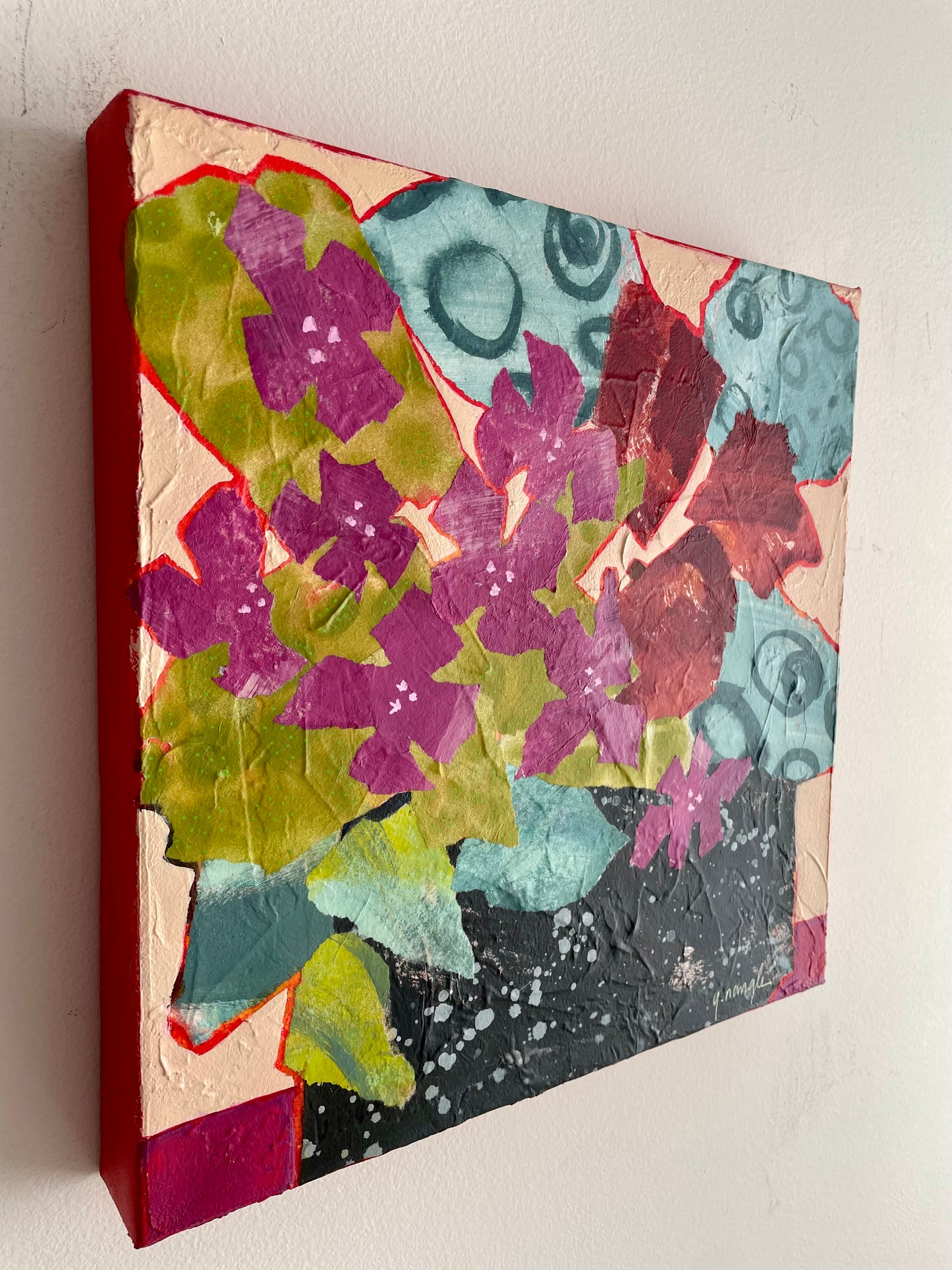 ”In Bloom”  $350 - 12"x 12" mixed media Acrylic and painted papers on canvas