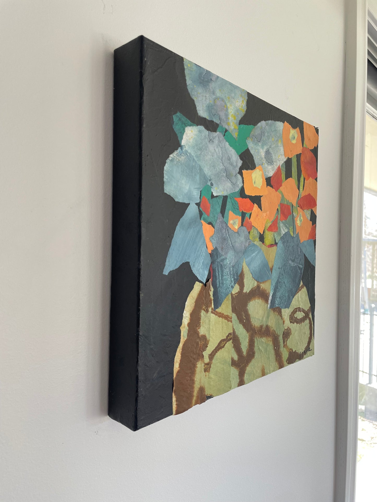“Bits in bloom”  $350 - 12"x 12" mixed media Acrylic and painted papers on canvas