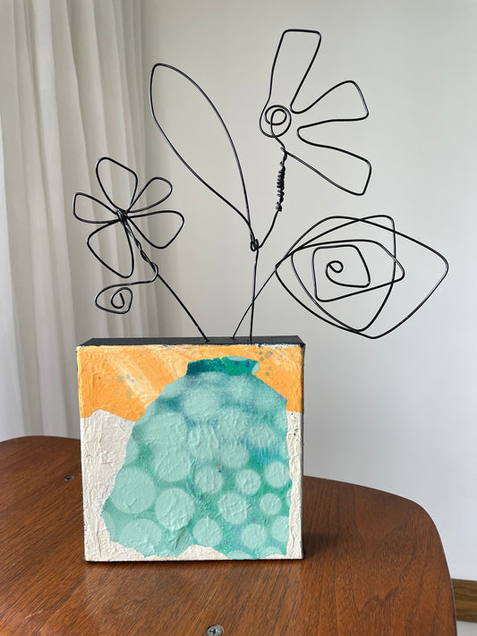 “The Bloom Above”  $150- 6"x 6" canvas with wire doodle flowers emerging from the top