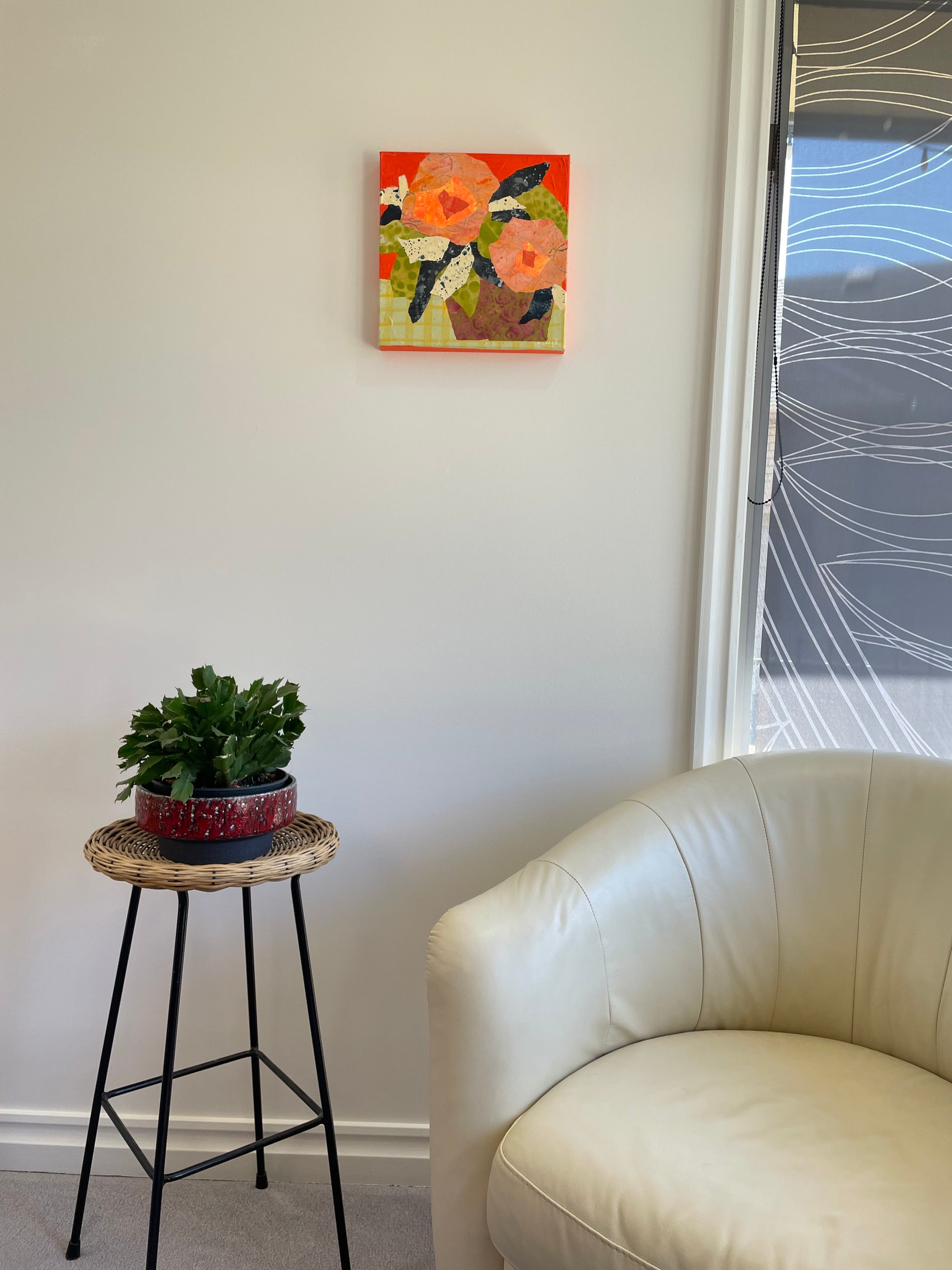 Bold abstract floral wall art Peachy Rebels 12x12 in a neutral modern room adding peach, orange, and navy colour to the space