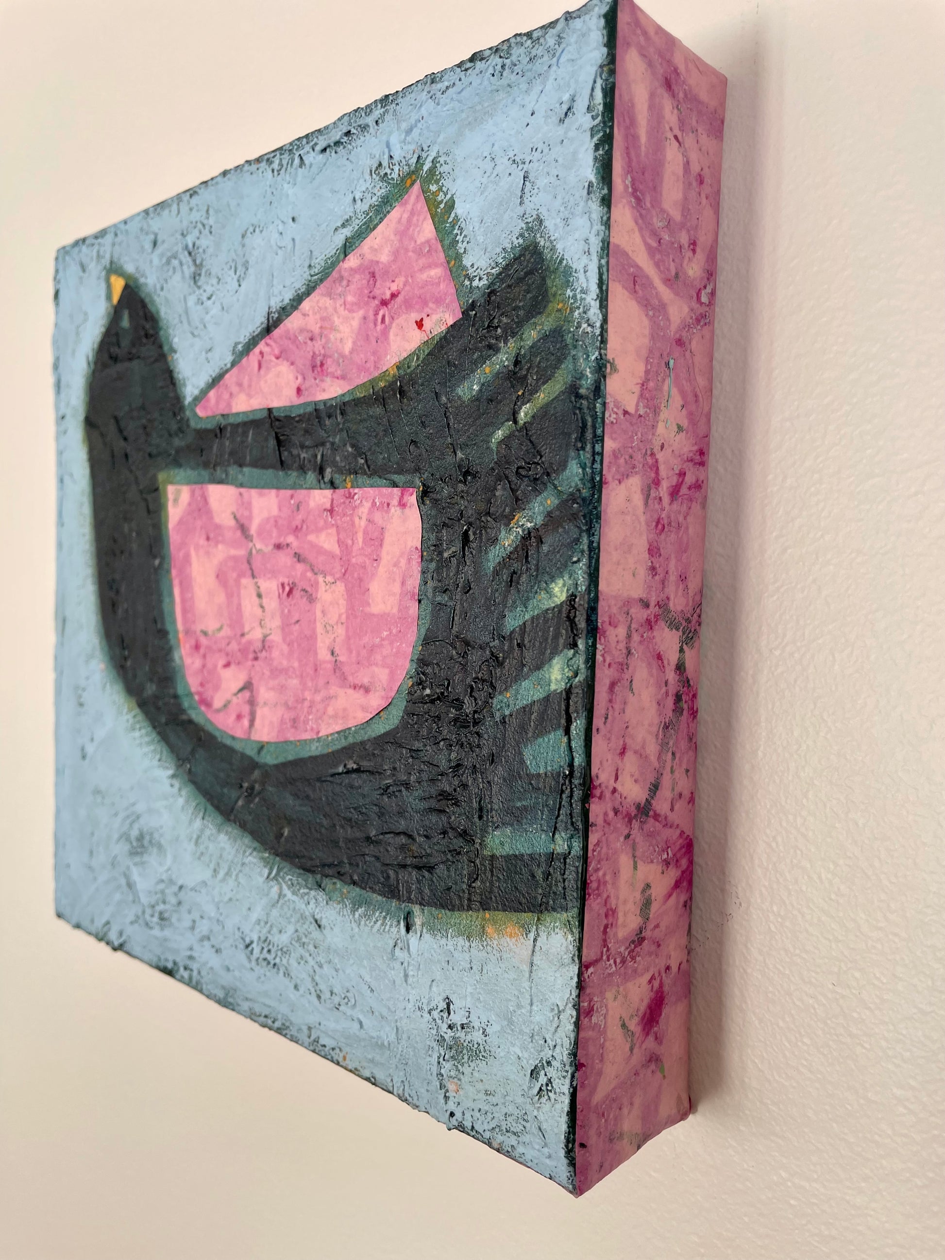 Side view of Take These Eyes and Learn to See showing pink collaged canvas edges